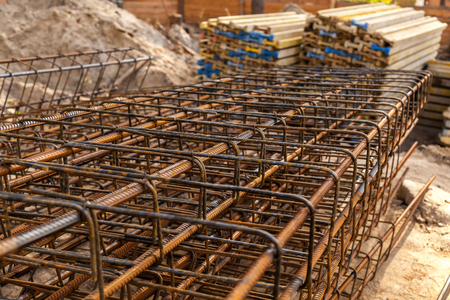 Design of reinforcement cage of reinforcement for concrete frame house, brick house, formwork for concrete pouring, construction site, working crane, construction of housesの写真素材