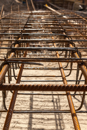 Design of reinforcement cage of reinforcement for concrete frame house, brick house, formwork for concrete pouring, construction site, working crane, construction of housesの写真素材