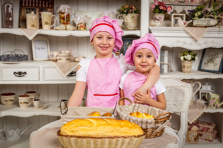 children cook, Sisters in the kitchen, kids in the kitchenの写真素材