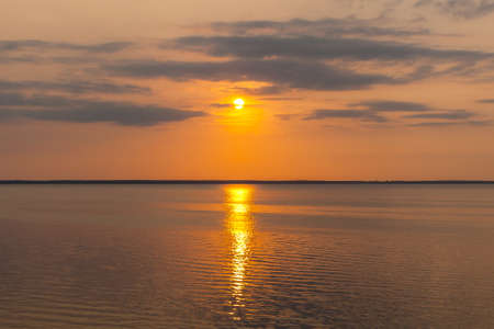 beautiful sunset sunrise water nature calm quiet beautiful landscapeの写真素材