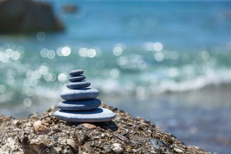 A small Zen out of a pile of stones on a rock,Stone balanceの写真素材