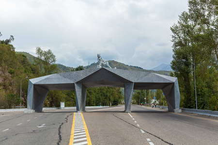 Arch in Kazakhstan. Metal arch with the statute of leopard on the peak.の写真素材