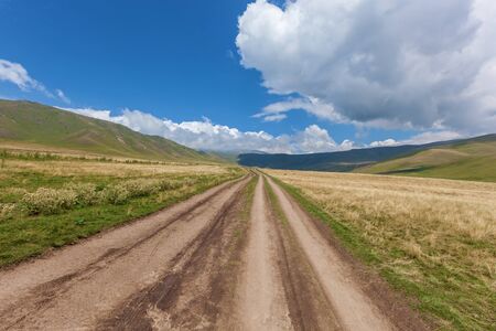 The mountain landscape of plateau of Assy is Kazakhstan,mountain dirt road の写真素材