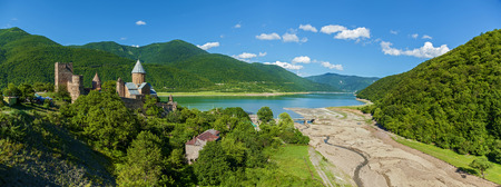 Panorama of mountains,  lake and  river. wild landscape and blue sky. Castel Ananuri.Sight of Georgiaの写真素材