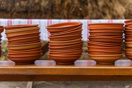 clay and glass Ukrainian dishes, old pots and bottlesの写真素材