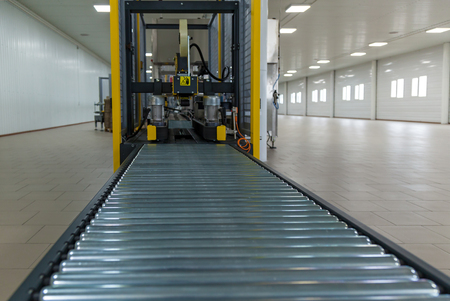 Strapping Machine for Industrail Packaging Line, Modern machine for packaging line in factory,...