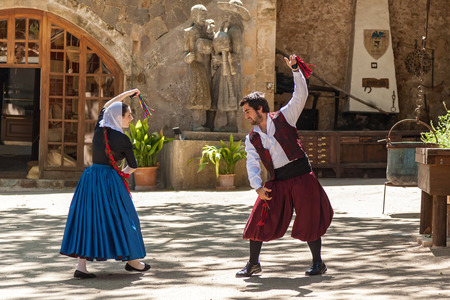 Spain Palma de Mallorca June 23, 2016: Dances with castanets of two graceful dancers in old costumes at the estate Camino de Caledor. San Juan, Mallorca, Spain's largest islandのeditorial素材
