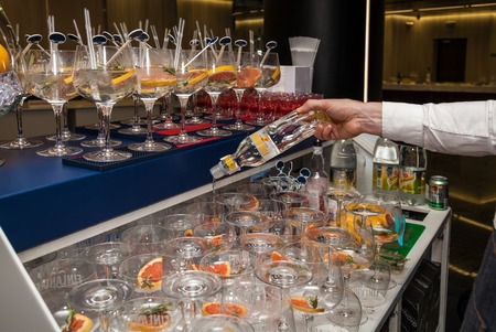 Ukraine Kiev March 22, 2016: The barman makes a cocktail Finlandia Grapefruit Tonic.Finlandia Grapefruit is a Finnish vodka belonging to the Brown-Forman corporation.のeditorial素材