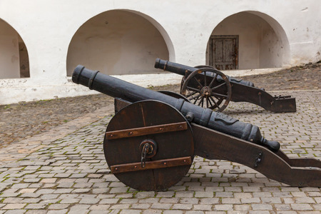 Mukachevo, Ukraine October 5, 2017: The old iron cannon in Palanok Castle, Mukacheve. Palanok Castle - one of the oldest Ukrainian fortresses in Mukacheve.のeditorial素材