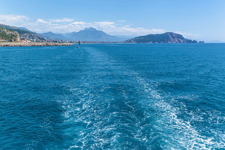 Alanya city rocks sea and mountains. Alanya coastline view from the seaの写真素材