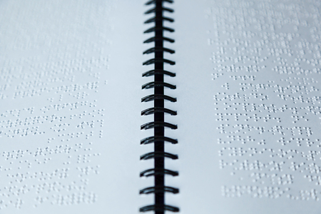 Page written in braille alphabet for blind peopleの写真素材