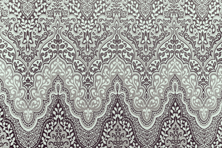 Floral ornament. Black-and-white ornate floral ornament with lots of swirls and arcs.Retro style or vintage for design and creativityの写真素材