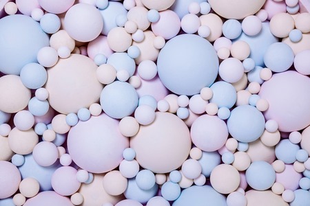 Colored foam balls in various sizes. Wedding decoration multicolored balls as a background. Texture round shape.の写真素材