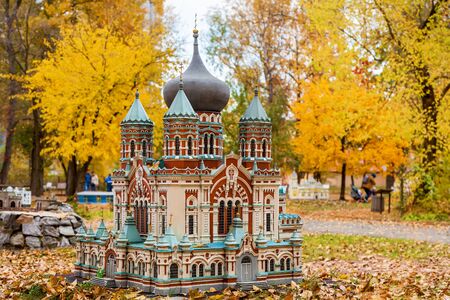 KIEV, UKRAINE October 21, 2018: Autumn amusement park in Kiev, Ukraine in miniature. Model of the St. Panteleimon's Cathedral of Theophania. Sights of Ukraine ancient houses, churches, museums, fortresses temples monasteriesのeditorial素材
