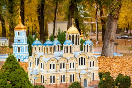 KIEV, UKRAINE October 21, 2018: Cathedral of St. Vladimir. Autumn amusement park in Kiev, Ukraine in miniature. Sights of Ukraine ancient houses, churches, museums, fortresses temples monasteriesのeditorial素材