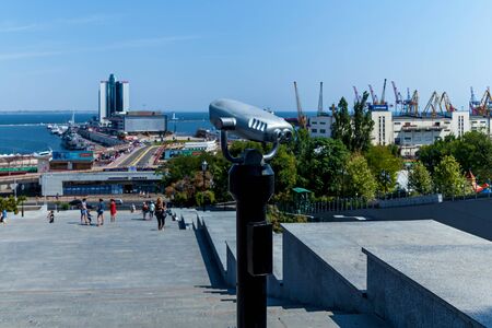The tourist binocular pointing out to the seashore on a sunny day. Amazing landscape of the coastal...