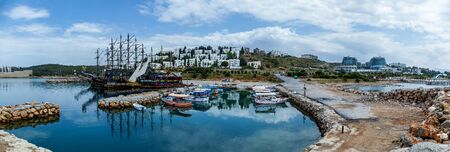 Turkey Alanya May 08, 2019: Amazing seascape of a natural bay with a big sailer and a lot of boats.のeditorial素材