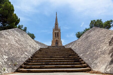 The old stone stairs leading to the traditional church on Addolorata Cemetery in Malta near...