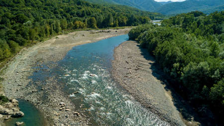 Stormy river Belaya in the Khadzhokh gorge. Beautiful landscapes, canyons and gorges. Aerial view...