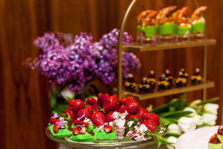 Strawberries, chopped and whole for decoration, banquet platter for events and buffets. Catering,...