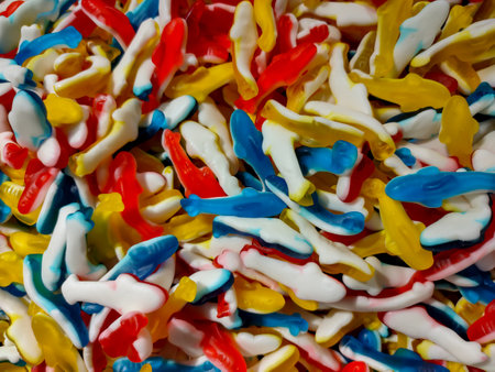 Background from multicolored chewing candies of different formsの写真素材