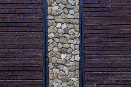 Wall texture with wooden boards and masonryの写真素材