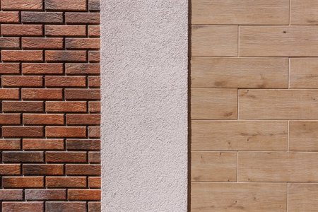 Different textures of the exterior decoration of the walls of the house. Combinations of decorative...