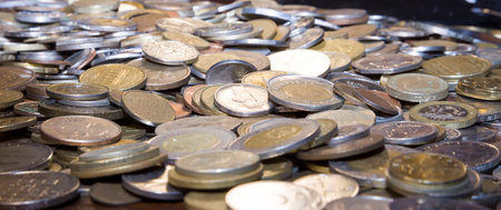 Lots of coins, pot of money, oodles of money.の写真素材