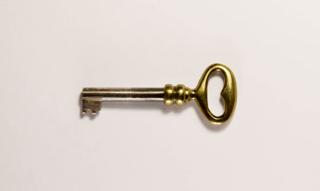 Old furniture key. Bronze and steel.の写真素材
