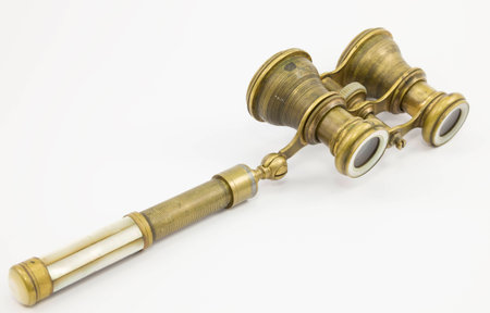 Natural vintage opera glasses with pearl inserts on a white background.の写真素材
