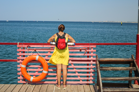 the girl on the dockの写真素材