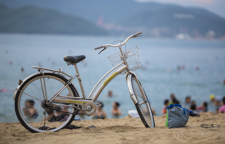 Old bicycle on the beach. Vietnam.の写真素材