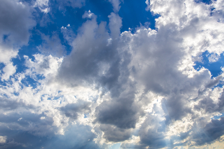 blue sky with white clouds and nothing more.の写真素材