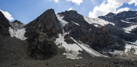 high in the mountains glacier and blue skyの写真素材