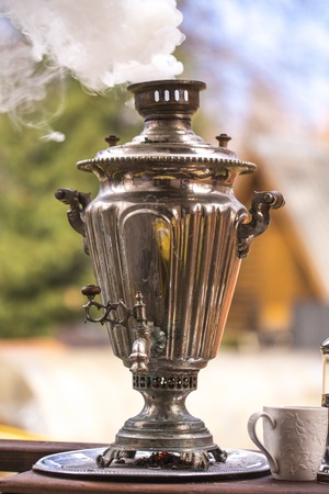 kettle on firewood in Russian traditions. Samovar.の写真素材