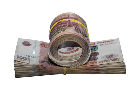 a large pile of money stretched by an elastic bandの写真素材