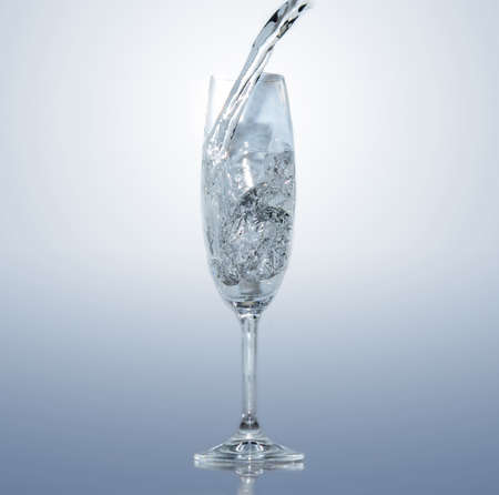 frozen water splash in a glassの写真素材
