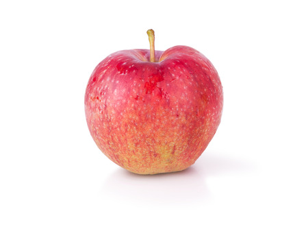 red ripe apple on a white backgroundの写真素材