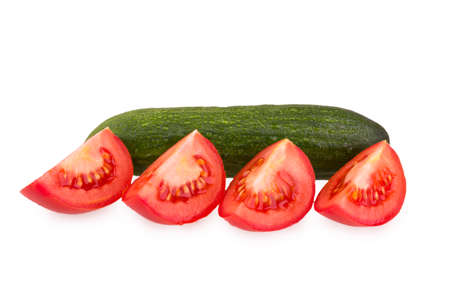 sliced tomato and whole cucumberの写真素材
