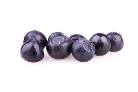 group of ripe blueberries on a white backgroundの写真素材
