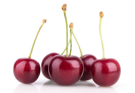 ripe red cherries on white backgroundの写真素材