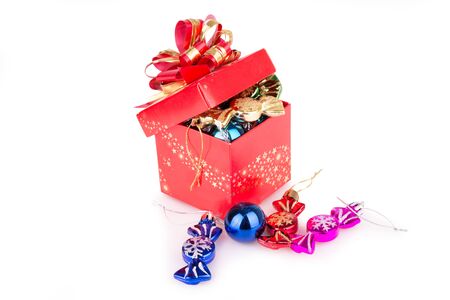 Red Gift Box with Christmas toys isolatedの写真素材
