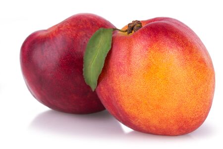 juicy ripe nectarines isolatedの写真素材