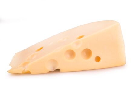 piece of Dutch cheese on a white backgroundの写真素材