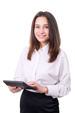 beautiful business girl with calculator isolatedの写真素材