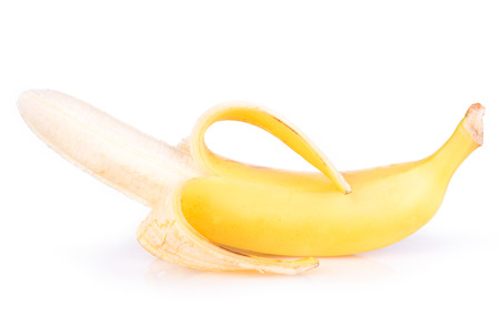 ripe peeled banana on a white backgroundの写真素材