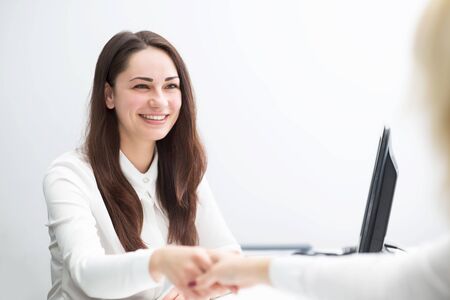 beautiful smiling business woman in the office concludes contractの写真素材
