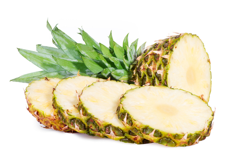 Cut ripe pineapple with rings on a white backgroundの写真素材