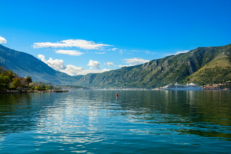 Harbour and big white ship at Boka Kotor bay (Boka Kotorska), Montenegro, Europe.の写真素材