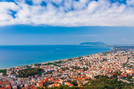 Panoramic sea landscape with Terracina, Lazio, Italy. Scenic resort town village with nice sand beach and clear blue water. Famous tourist destination in Riviera de Ulisseの写真素材